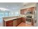 Well-appointed kitchen offering stainless steel appliances, ample counter space, and direct sightlines to living area at 1453 Joy Ave, Charleston, SC 29407
