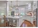 Spacious kitchen with white cabinetry, a large center island, and modern appliances at 1535 Capel St, Mount Pleasant, SC 29466