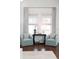 Cozy sitting area featuring two armchairs, hardwood floors, and natural light at 1535 Capel St, Mount Pleasant, SC 29466