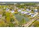 Neighborhood with lake views, mature trees, and a mix of home styles at 1543 Gemstone Dr, Mount Pleasant, SC 29464