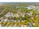 Residential community with lush greenery, mature trees, and a serene lake at 1543 Gemstone Dr, Mount Pleasant, SC 29464