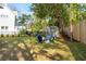 Beautiful backyard featuring a well-maintained lawn, shed, and comfortable outdoor seating area at 1543 Gemstone Dr, Mount Pleasant, SC 29464