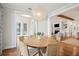 Bright dining room with a round table set, hardwood floors, and stylish lighting fixture at 1543 Gemstone Dr, Mount Pleasant, SC 29464