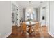 Charming dining room with a round table, wicker chairs, and a unique light fixture for intimate gatherings at 1543 Gemstone Dr, Mount Pleasant, SC 29464