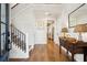 Elegant foyer with hardwood floors, staircase, and decorative console table at 1543 Gemstone Dr, Mount Pleasant, SC 29464