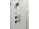 Close up of a shower showcasing modern fixtures, white subway tile, and recessed shelving at 1543 Gemstone Dr, Mount Pleasant, SC 29464