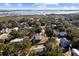 Breathtaking aerial view of homes nestled among lush trees near the marshland and waterways at 1577 Periwinkle Dr, Mount Pleasant, SC 29466