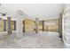 Unfinished basement with concrete floor and exposed support pillars, offering potential for customization at 1577 Periwinkle Dr, Mount Pleasant, SC 29466