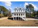 Beautiful two-story house featuring classic design, landscaped front yard and ample natural light at 1577 Periwinkle Dr, Mount Pleasant, SC 29466