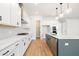 Modern kitchen featuring white cabinets, quartz countertops, and stainless steel appliances at 1577 Periwinkle Dr, Mount Pleasant, SC 29466