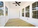Covered porch area featuring classic finishes, ceiling fan, and ample natural light at 1577 Periwinkle Dr, Mount Pleasant, SC 29466