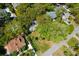 Aerial view showcasing a home with a well-manicured lawn and mature trees in a suburban setting at 17 24Th Ave, Isle of Palms, SC 29451