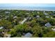 Aerial view of the property with beach access, surrounded by lush greenery, charming homes, and the beautiful coastline at 17 24Th Ave, Isle of Palms, SC 29451