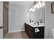 Bright bathroom features dual sinks, vanity with a large mirror and walk-in shower at 17 24Th Ave, Isle of Palms, SC 29451