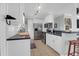 Well-equipped kitchen featuring stainless steel appliances and bright white cabinets, perfect for culinary enthusiasts at 17 24Th Ave, Isle of Palms, SC 29451