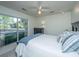 Light filled bedroom features a large window and dark furniture at 1722 S Nicole Pl, Charleston, SC 29414