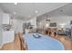 Dining area leading to kitchen and living spaces with a blue patterned tablecloth at 1722 S Nicole Pl, Charleston, SC 29414