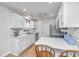 Bright kitchen featuring white cabinets, modern countertops, and ample space for cooking and entertaining at 1722 S Nicole Pl, Charleston, SC 29414