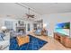 Bright living room featuring a cozy fireplace, comfortable seating, and hardwood floors for a relaxing atmosphere at 1722 S Nicole Pl, Charleston, SC 29414