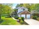 Charming two-story home with a two-car garage, a landscaped front yard, and a welcoming entryway at 192 Bamert St, Summerville, SC 29483