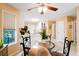 Cozy breakfast nook featuring a glass-top table, seating for four, and a view to the kitchen at 192 Bamert St, Summerville, SC 29483