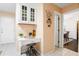 Butler's pantry with built-in shelves, drawers, seating, and decorative wall art at 192 Bamert St, Summerville, SC 29483