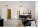 Large main bedroom featuring a four-poster bed, ceiling fan, and ensuite bathroom at 192 Bamert St, Summerville, SC 29483