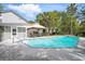 Beautiful backyard pool with lounge chairs and a covered area perfect for entertaining at 192 Bamert St, Summerville, SC 29483