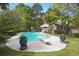 Stunning pool with diving board, patio area, and meticulously manicured landscape at 192 Bamert St, Summerville, SC 29483