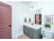 This bathroom features a large mirror, updated faucet, and framed artwork next to the toilet at 2013 Grey Marsh Rd, Mount Pleasant, SC 29466