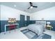 This bedroom is staged as a room and has a desk and ample natural light at 2013 Grey Marsh Rd, Mount Pleasant, SC 29466