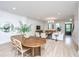 Open-concept living room with hardwood floors, modern furniture, and dining area at 2013 Grey Marsh Rd, Mount Pleasant, SC 29466