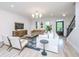 Comfortable living room with hardwood floors, modern furniture, and natural light at 2013 Grey Marsh Rd, Mount Pleasant, SC 29466
