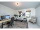 Functional office featuring a treadmill, desk, and natural light at 2013 Grey Marsh Rd, Mount Pleasant, SC 29466
