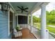 Inviting covered porch with comfortable seating and classic white columns at 2013 Grey Marsh Rd, Mount Pleasant, SC 29466