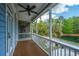 This screened porch has a ceiling fan and outdoor views at 2013 Grey Marsh Rd, Mount Pleasant, SC 29466