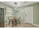 Cozy dining area with a round table, industrial-style chairs, and modern pendant lighting at 202 Oak Cir, Walterboro, SC 29488