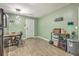 The dining area offers a table with modern seating and features a convenient door to the outside at 202 Oak Cir, Walterboro, SC 29488