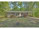 Charming single-story brick home with well-maintained landscaping and a welcoming entrance at 202 Oak Cir, Walterboro, SC 29488