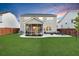 Well-maintained backyard with a screened-in porch and outdoor seating area for entertaining at 204 Honey Horn Dr, Summerville, SC 29486