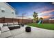 Backyard patio area featuring comfortable seating and a fire pit, perfect for gatherings and relaxing at 204 Honey Horn Dr, Summerville, SC 29486