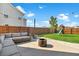An expansive backyard features a patio, play set, and well-maintained lawn, ideal for outdoor activities and relaxation at 204 Honey Horn Dr, Summerville, SC 29486