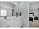 Modern bathroom featuring double sinks, and a view of the bedroom at 204 Honey Horn Dr, Summerville, SC 29486