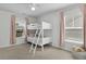 Sunlit bedroom boasts a white bunk bed, complementing the neutral walls and adding a cozy touch at 204 Honey Horn Dr, Summerville, SC 29486