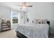 Bright bedroom with shiplap wall and large windows overlooking the backyard at 204 Honey Horn Dr, Summerville, SC 29486