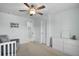 Bright, airy bedroom features a dresser and decorative art piece at 204 Honey Horn Dr, Summerville, SC 29486