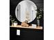 A charming decorative shelf features an elephant sculpture, plants, and a 'Blessed' sign, enhancing the home's cozy feel at 204 Honey Horn Dr, Summerville, SC 29486