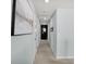 Hallway with carpet, light walls, and doors leading to bedrooms and bathrooms at 204 Honey Horn Dr, Summerville, SC 29486