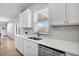 A kitchen featuring stainless steel appliances, a white backsplash, and quartz countertops at 204 Honey Horn Dr, Summerville, SC 29486