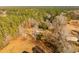 Expansive aerial view of property with lush greenery and open spaces providing privacy at 2042 Highway 402, Moncks Corner, SC 29461